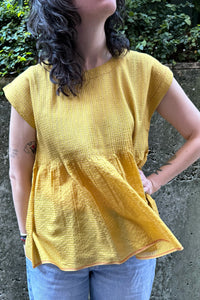 Dve one size cotton silk Rima top sleeveless with pintucked bodice in amber yellow.