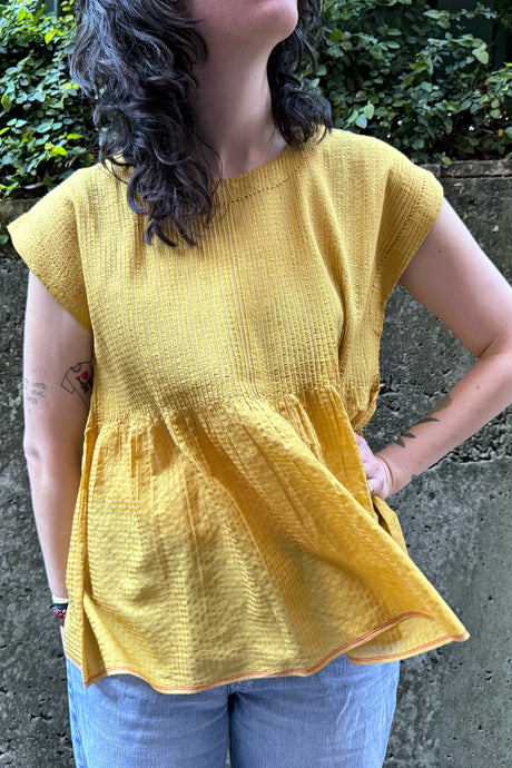 Dve one size cotton silk Rima top sleeveless with pintucked bodice in amber yellow.