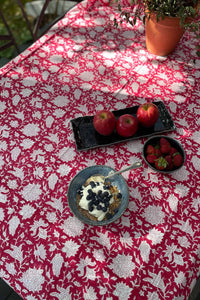 Blockprinted  cotton table cloth in raspberry red and white floral design, made by hand