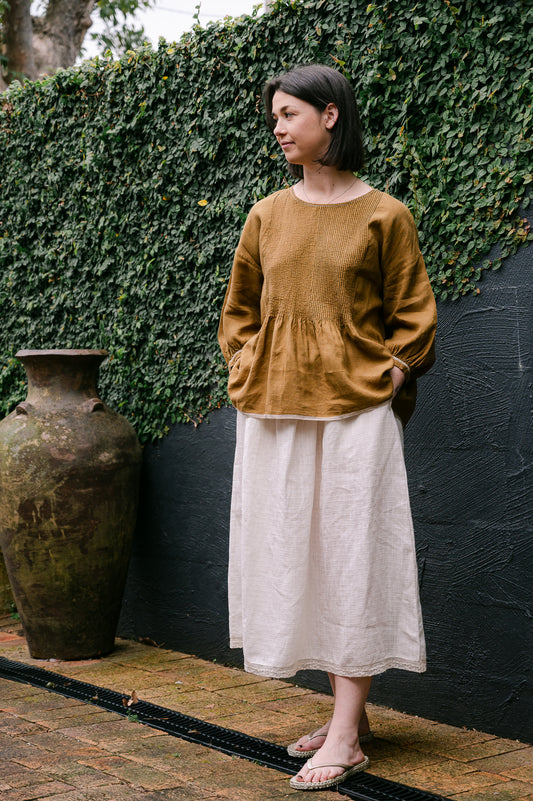 Dve one size pintucked linen Anisha top in mustard.