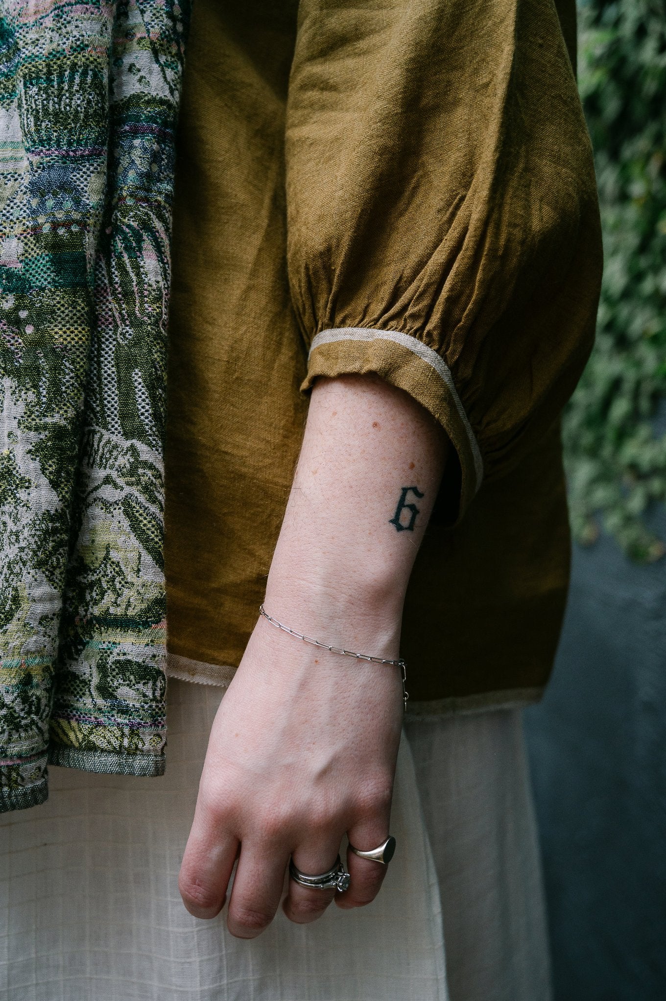 Dve one size pintucked linen Anisha top in mustard.