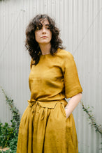 Load image into Gallery viewer, Studio Within x Juniper Hearth silk skirt in gold mustard.