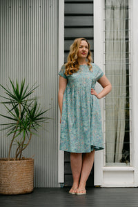 Juniper Hearth blockprint cotton dress with gathered skirt and pockets, in celadon aqua and blue floral.