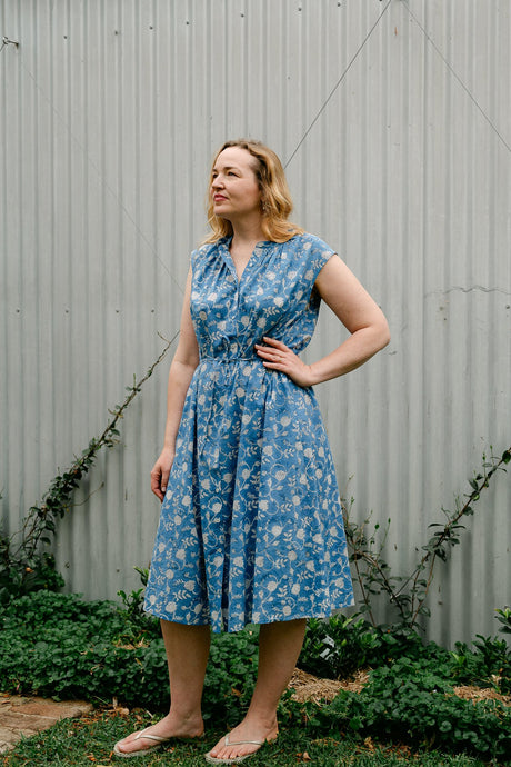 Juniper Hearth Zoe blockprint floral sleeveless cotton dress, buttonup with waist tie, in blue and white.