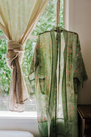 Ethically made, colourful pure cotton voile kimono robe hanging in a window