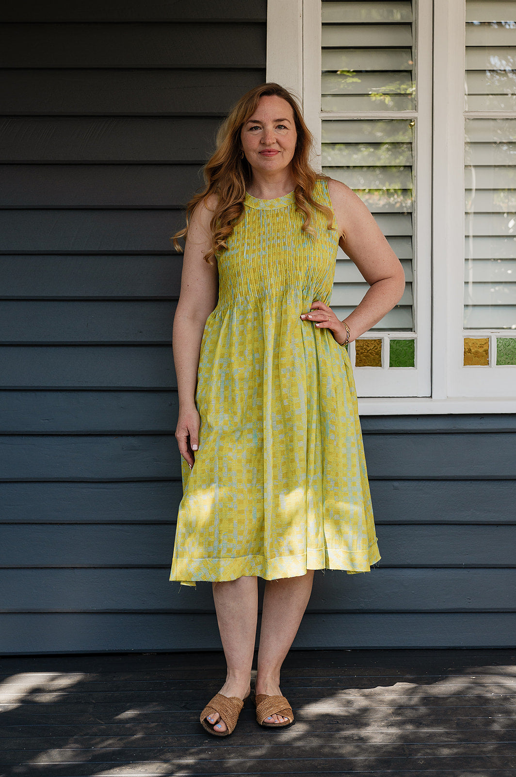 Neeru Kumar fine cotton silk pintucked sleeveless sundress in lime yellow with aqua check.