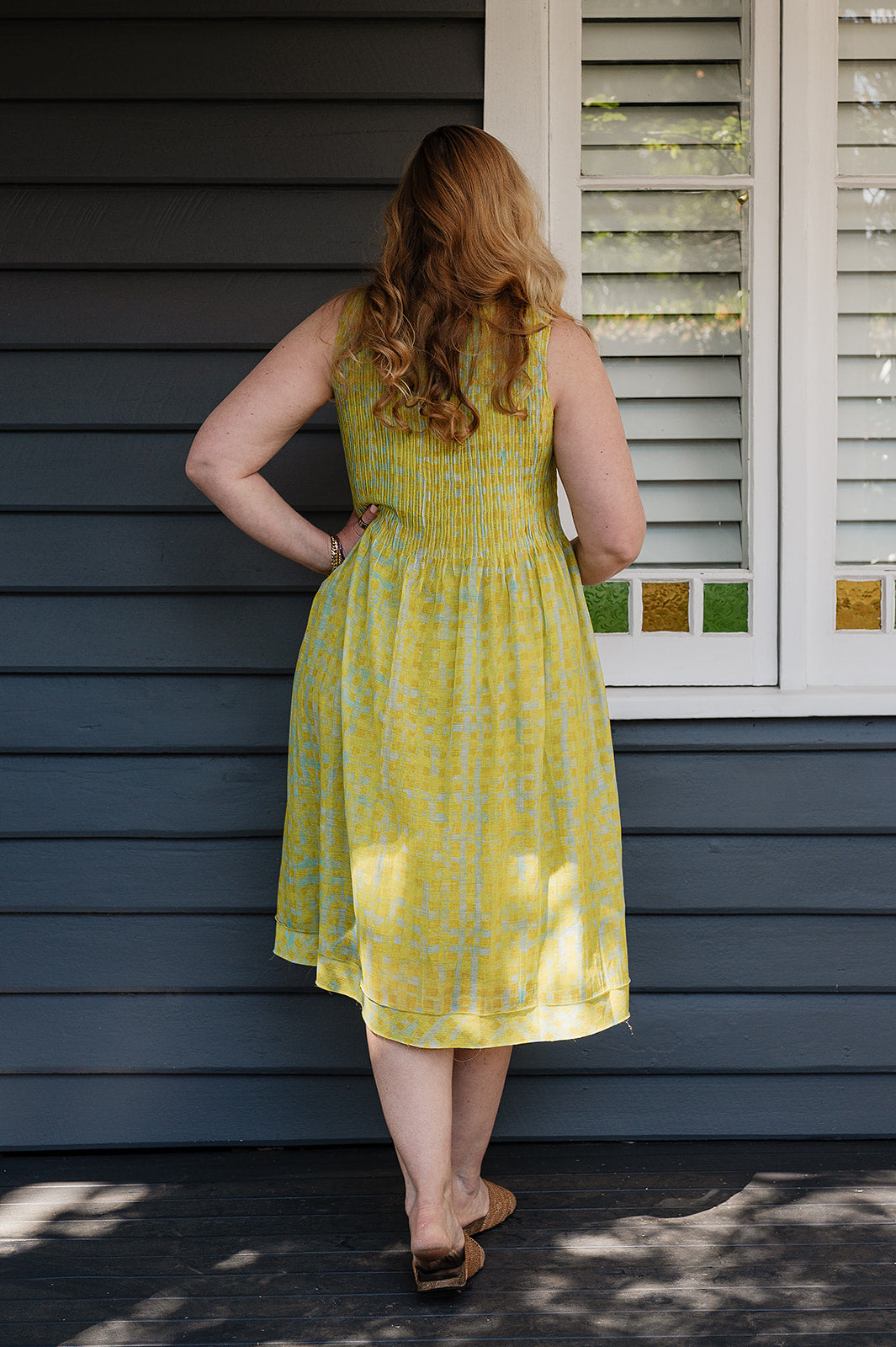 Neeru Kumar fine cotton silk pintucked sleeveless sundress in lime yellow with aqua check.