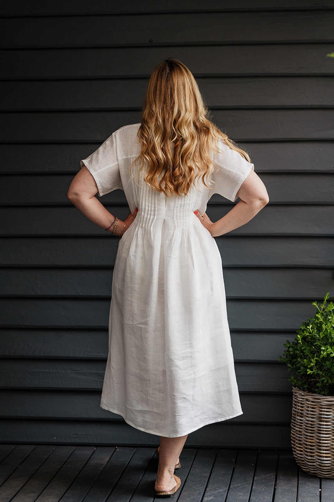 Manan Rasa sheer white linen dress with short sleeves, pleat detailing at the back.