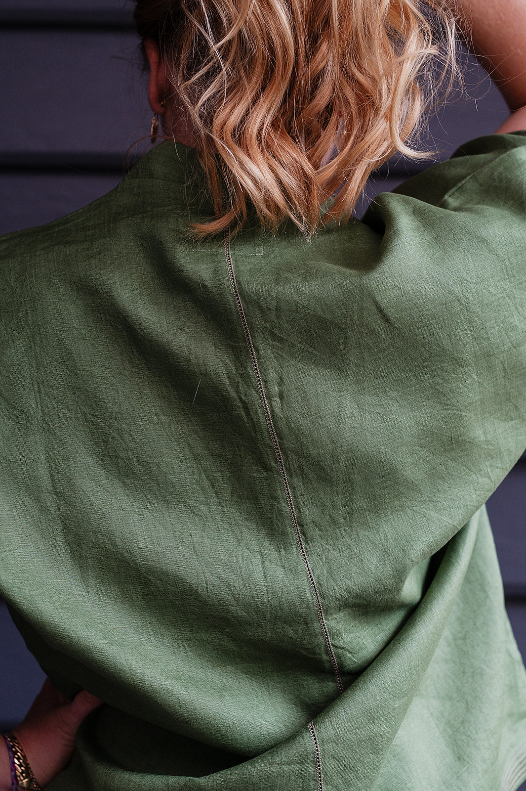 Manan Hoshi top in green linen, V-neck with elasticated sleeves.