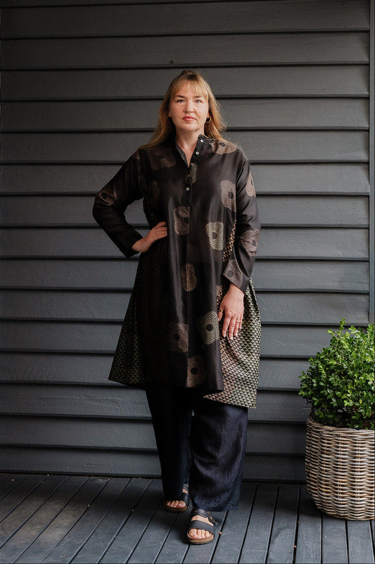 Brahma Karma chanderi cotton silk ebony tunic dress with bronze flowers and geometric side panels.