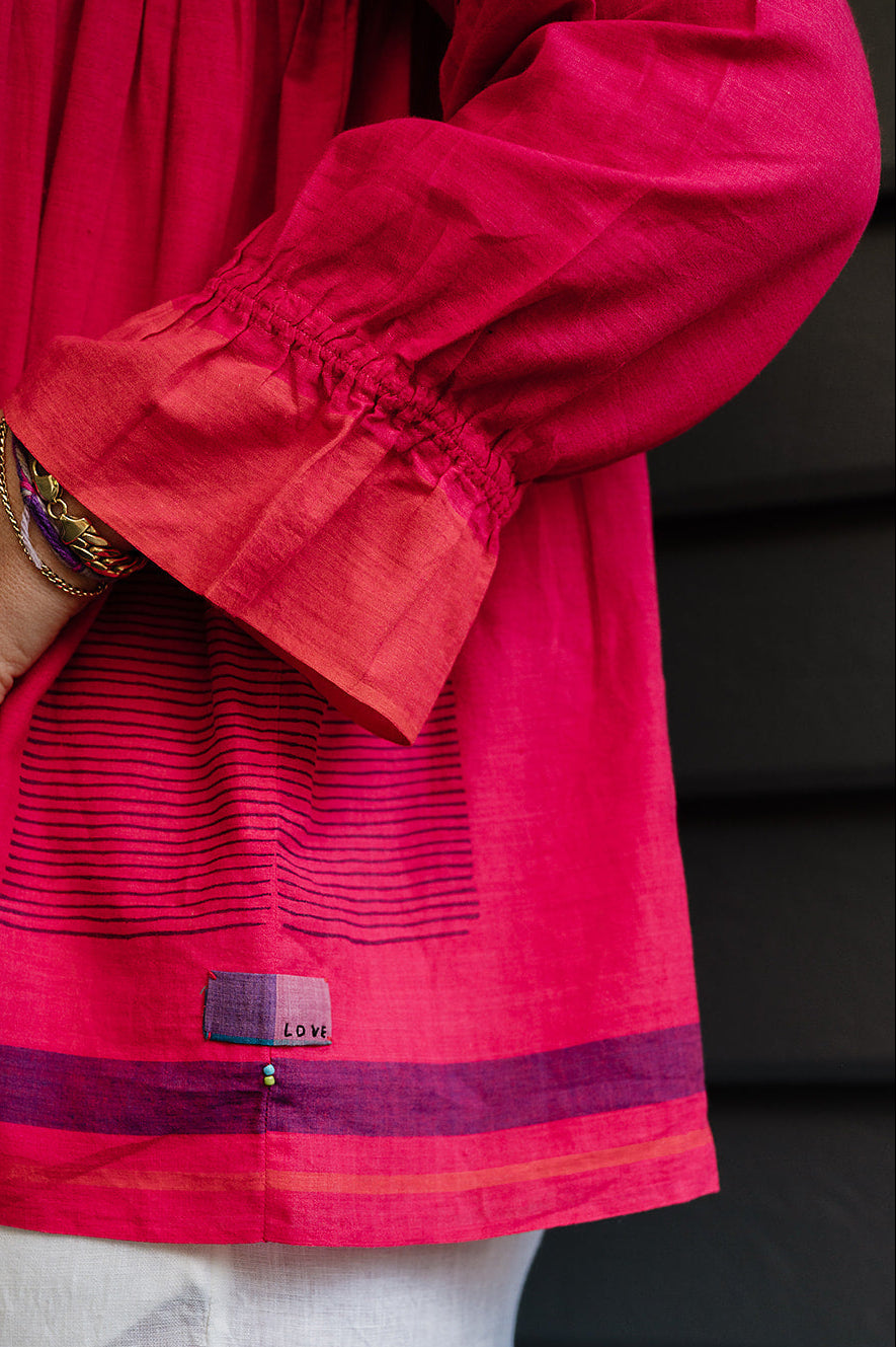 Lotus Veda Victoria blouse in handloom cotton bright raspberry pink red.