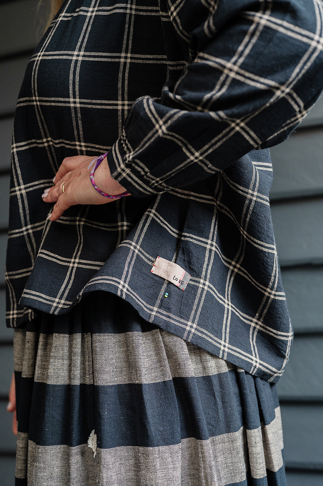 Lotus Veda Daffodil blouse in handloom kala cotton black and beige check.