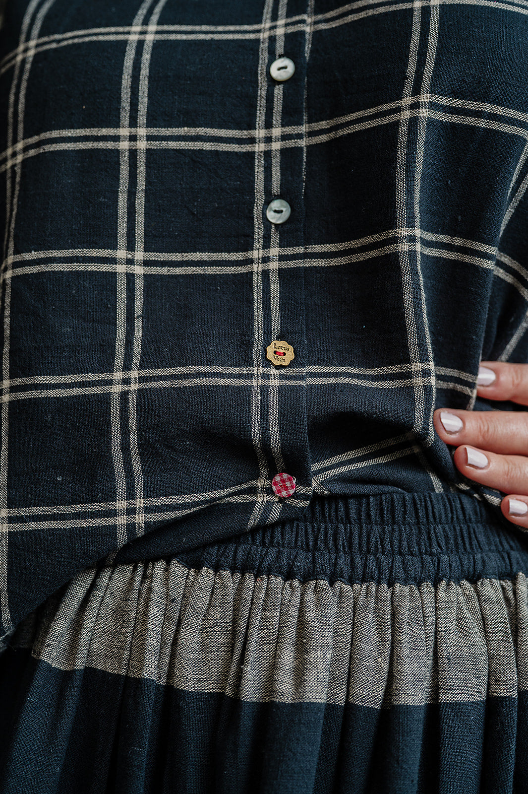 Lotus Veda Daffodil blouse in handloom kala cotton black and beige check.