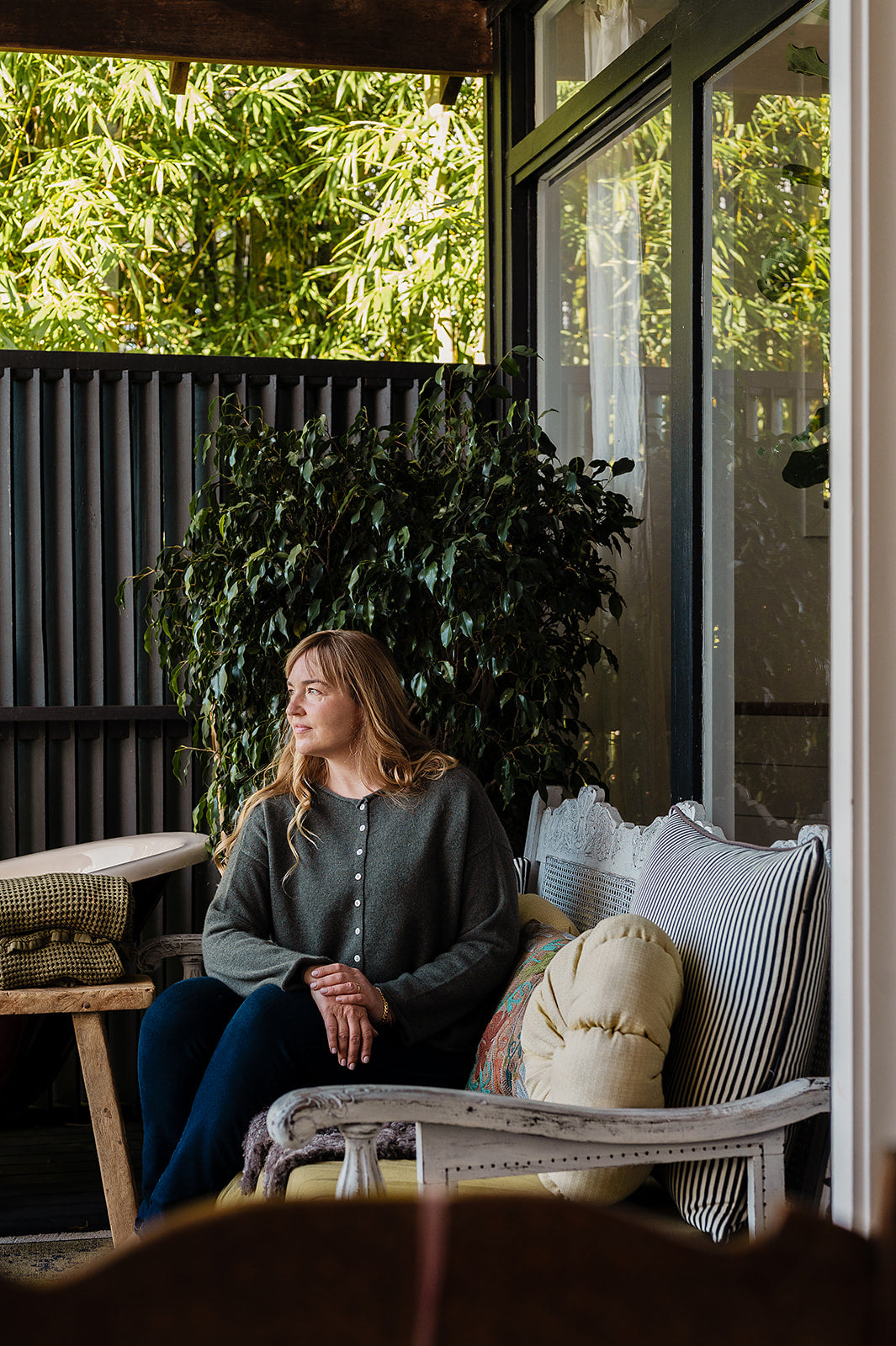 One size reversible cashmere cardigan in moor green.