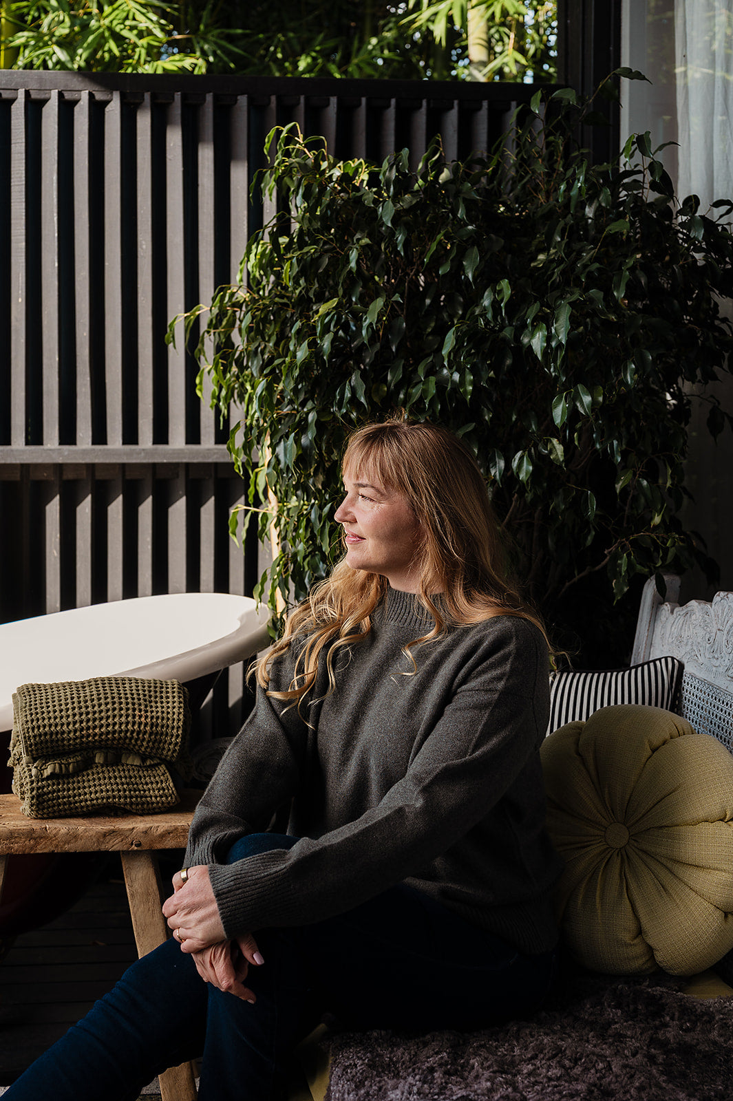 Cashmere turtle neck sweater in moor green.