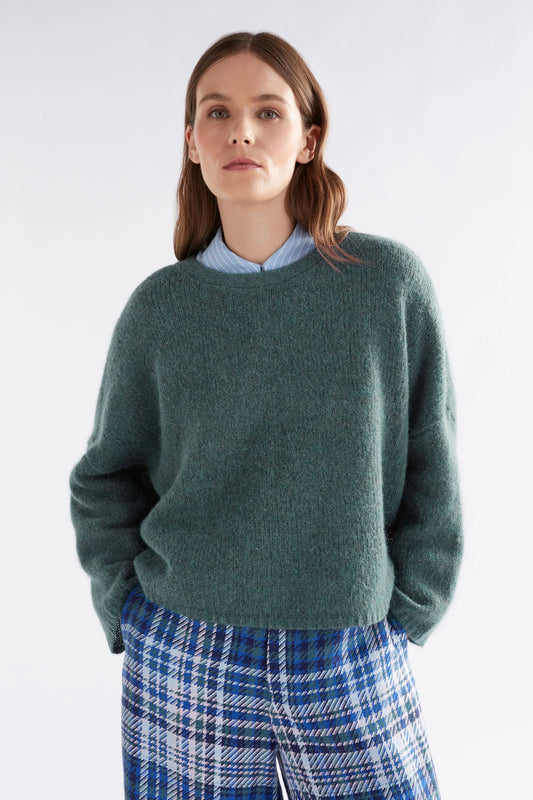 Elk Agna sweater in sea moss green.