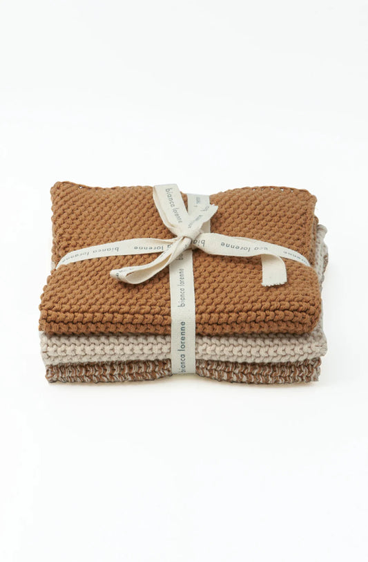 Bianca Lorenne set of 3 organic cotton knitted washcloths in clay tones.