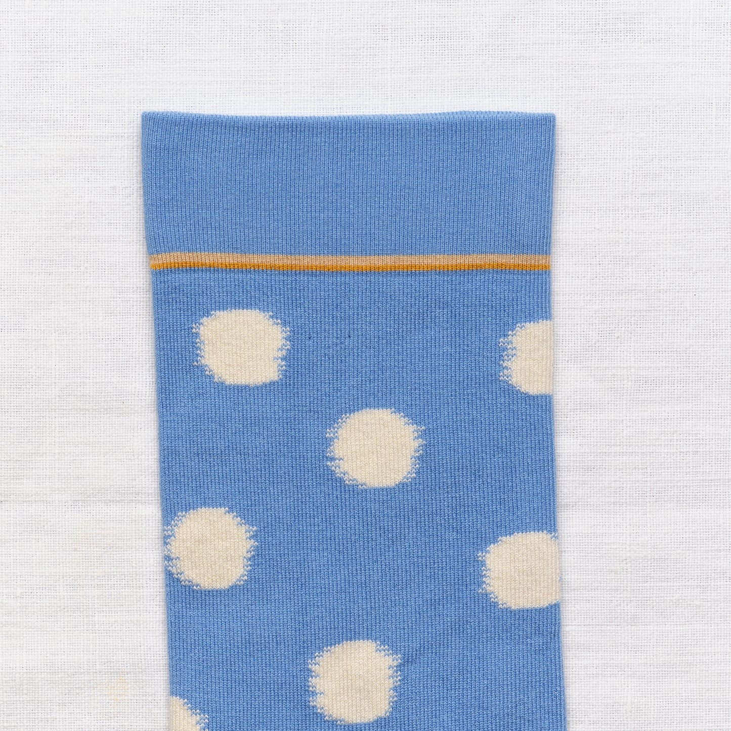 Bonne Maison cotton socks white spots on Aegean blue.