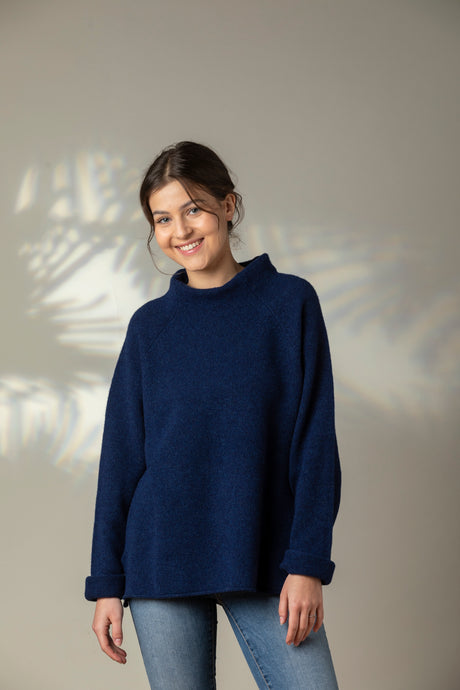 Eribe Corry raglan sweater in regatta blue.
