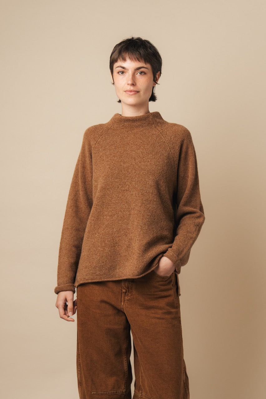 Eribe Corry merino wool turtle neck sweater in Driftwood brown.