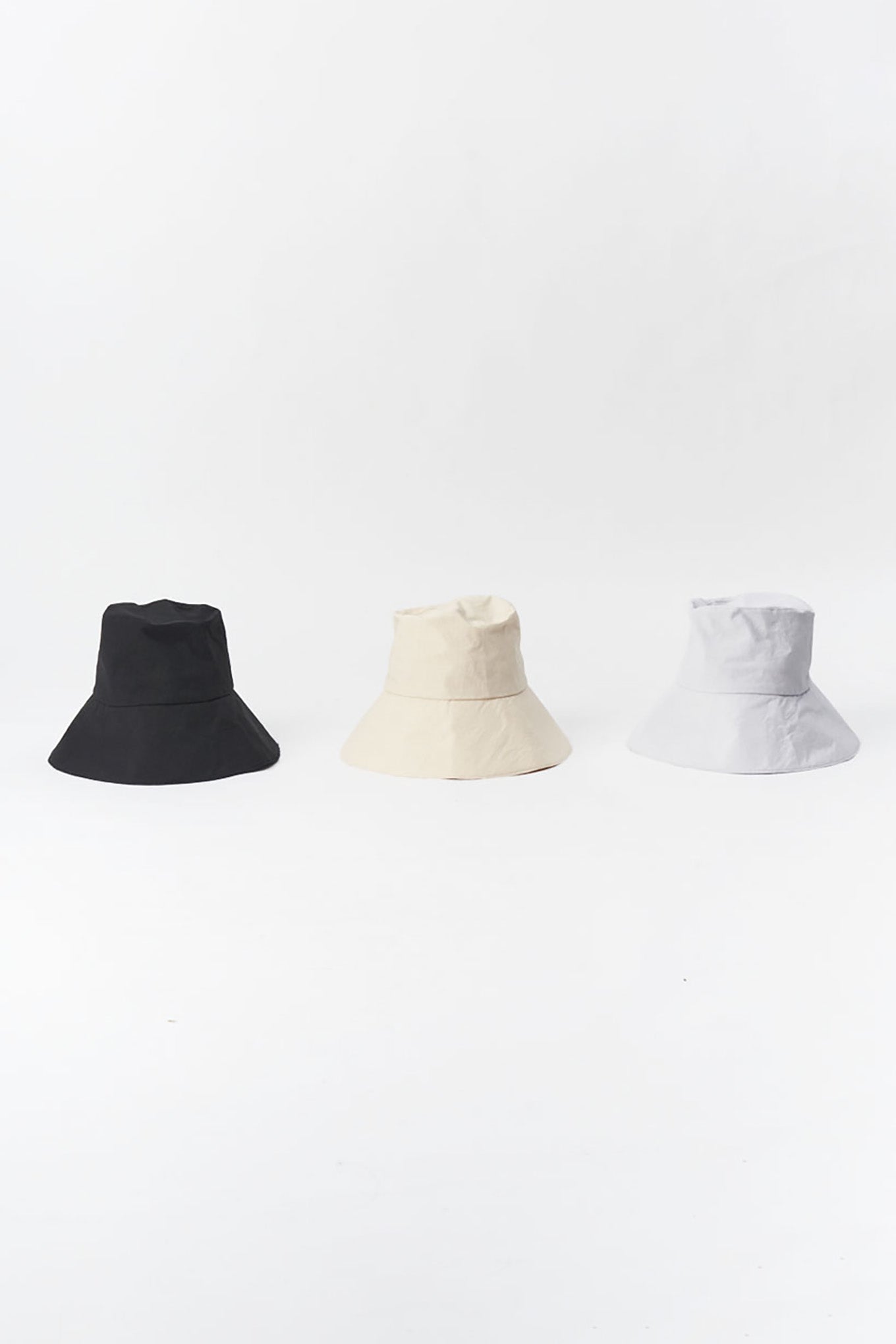 PCNQ made in Japan cotton bucket hats with generous brim.