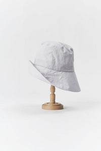 PCNQ made in Japan cotton bucket hat with generous brim in light grey.