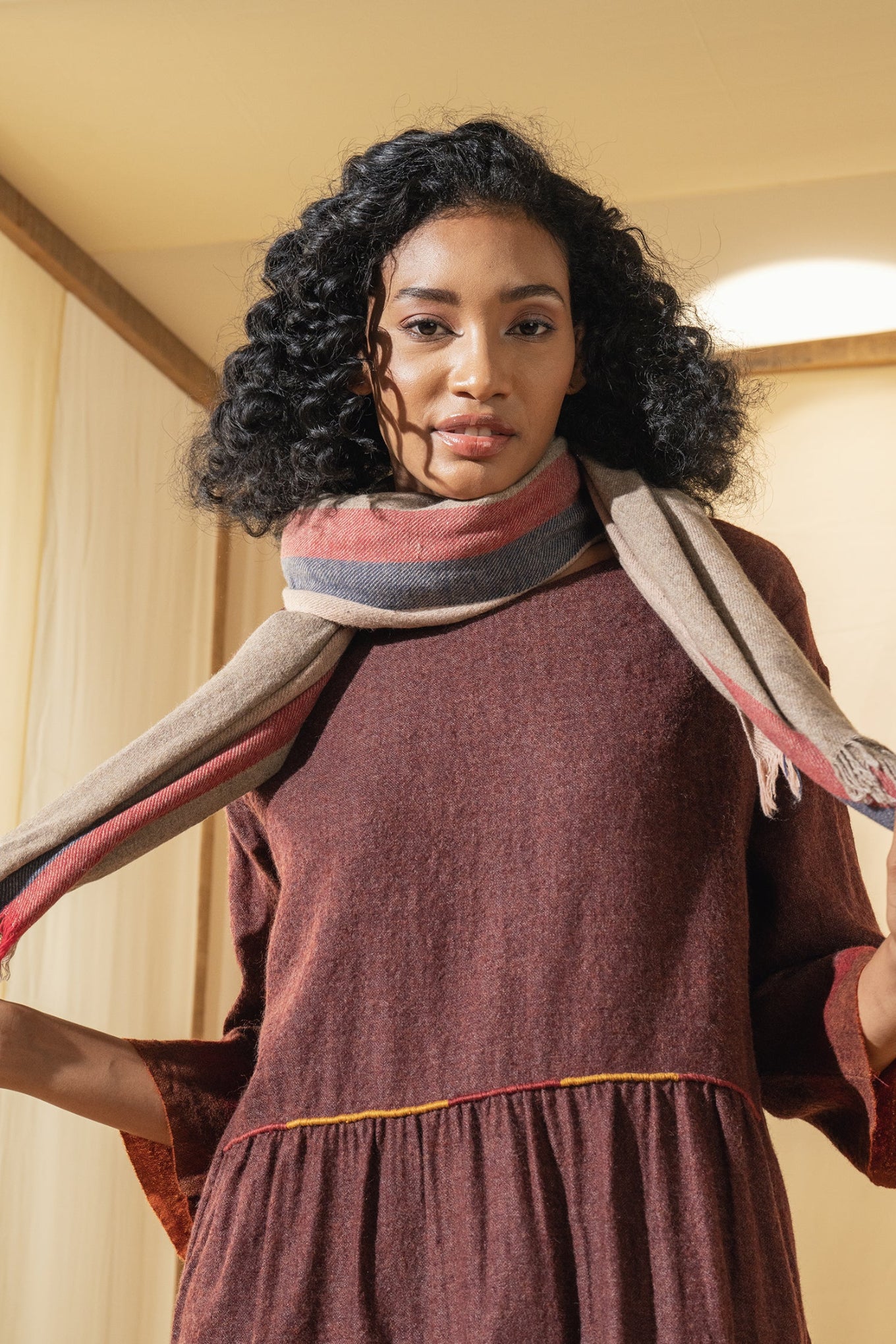 Dve soft wool scarf in oatmeal with red and navy selvedge stripes.