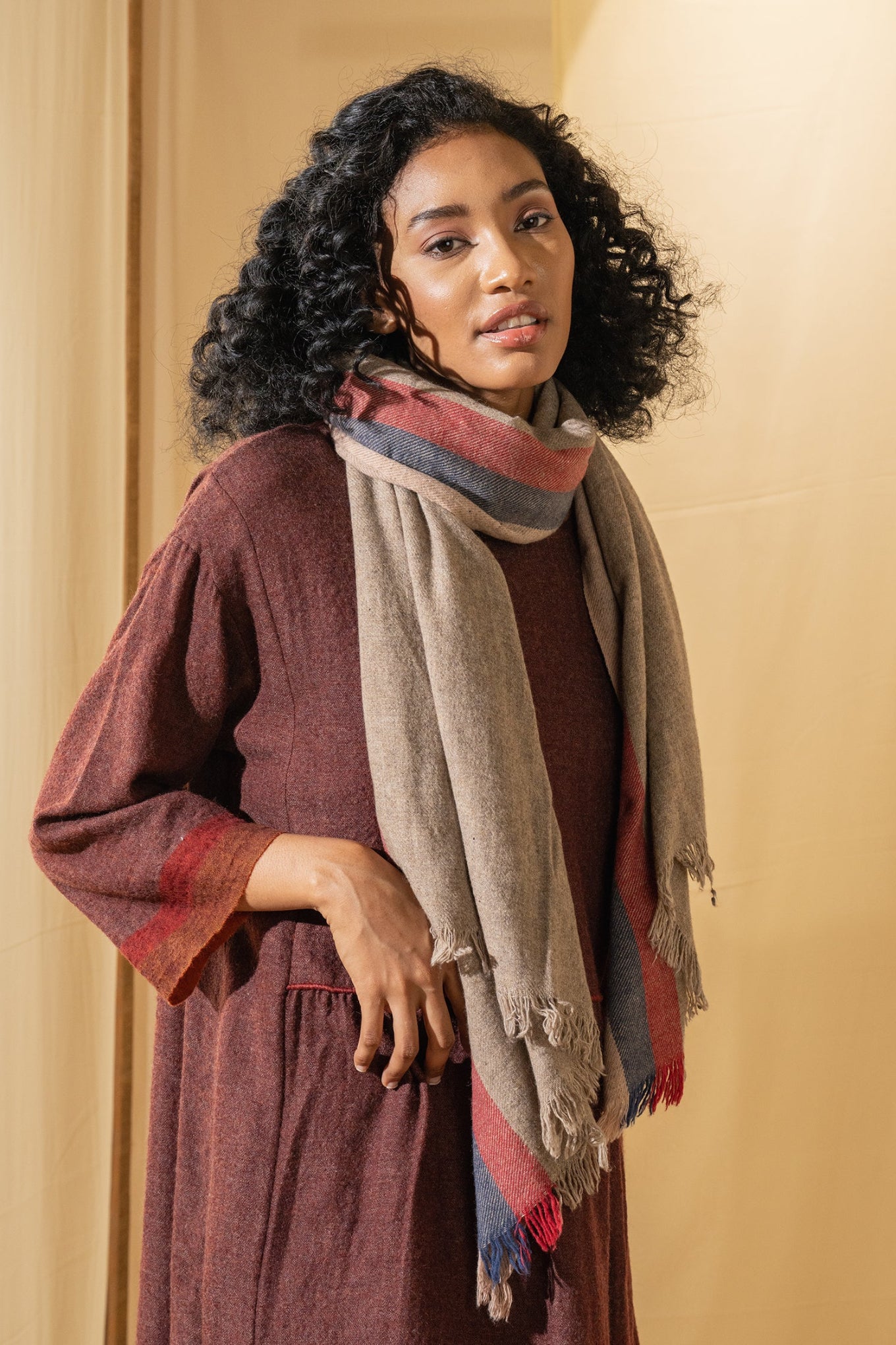 Dve soft wool scarf in oatmeal with red and navy selvedge stripes.