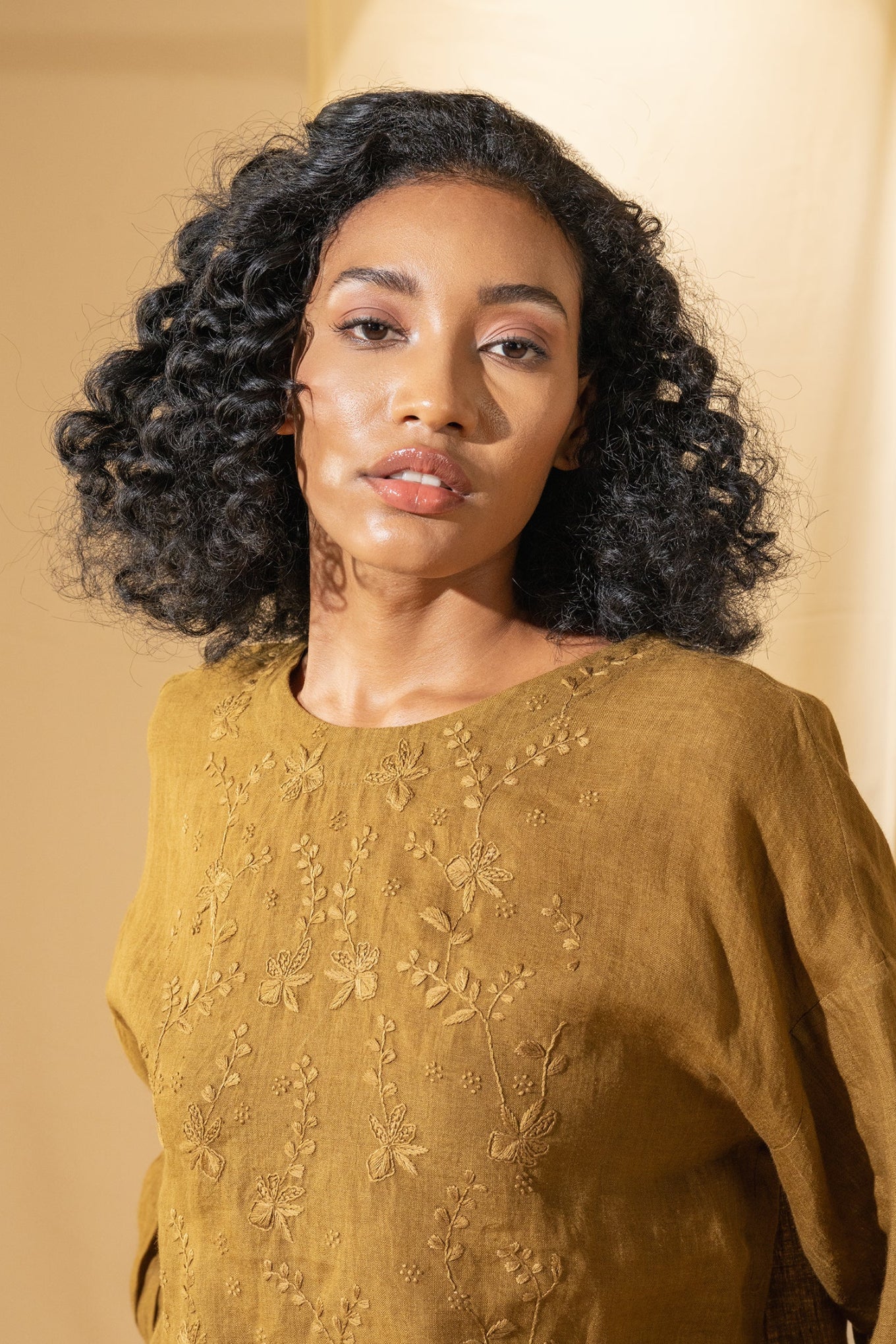 DVE Inaya blouse in embroidered mustard linen.