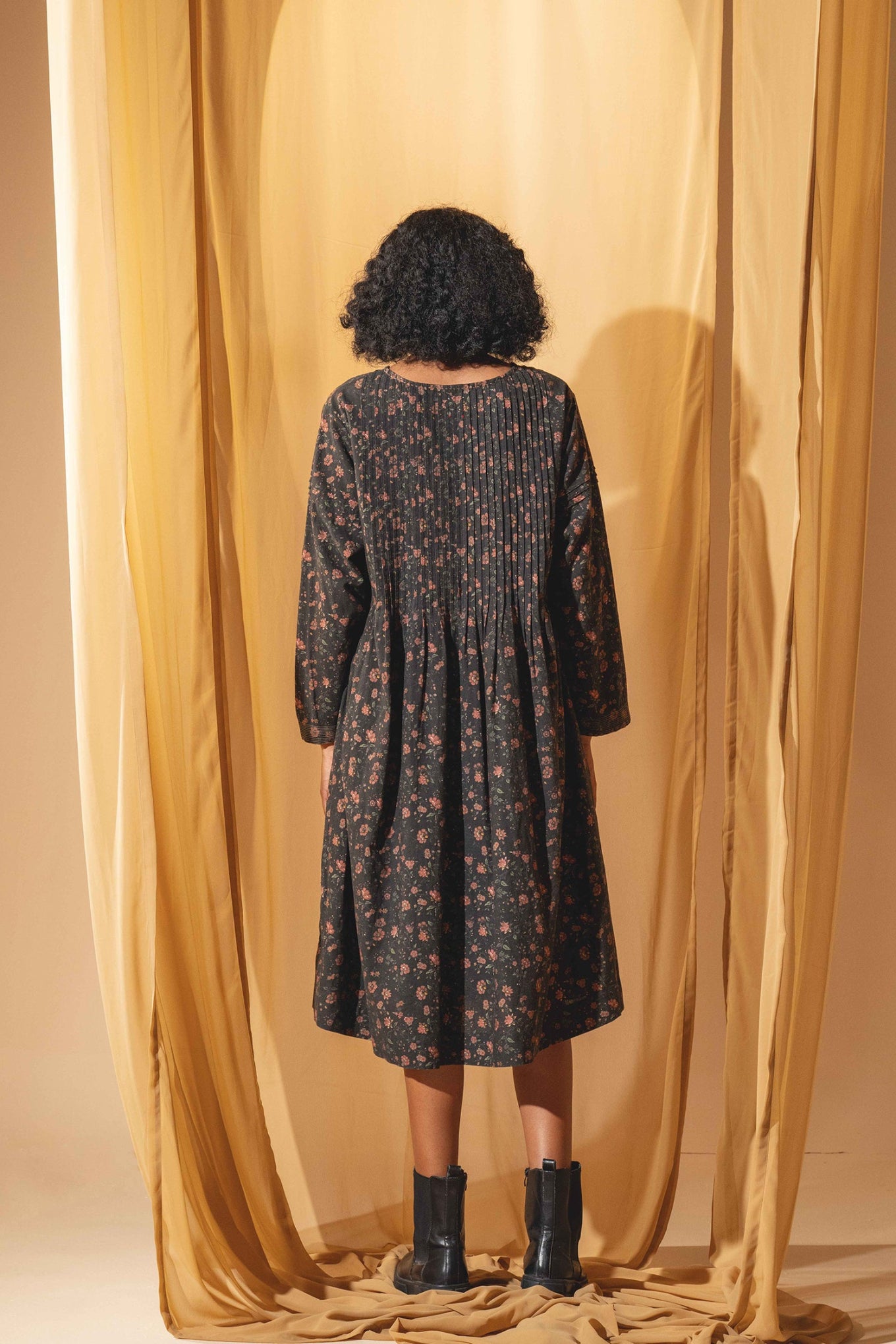 DVE Bhavya cotton linen long sleeve dress with pintucks in charcoal floral print.