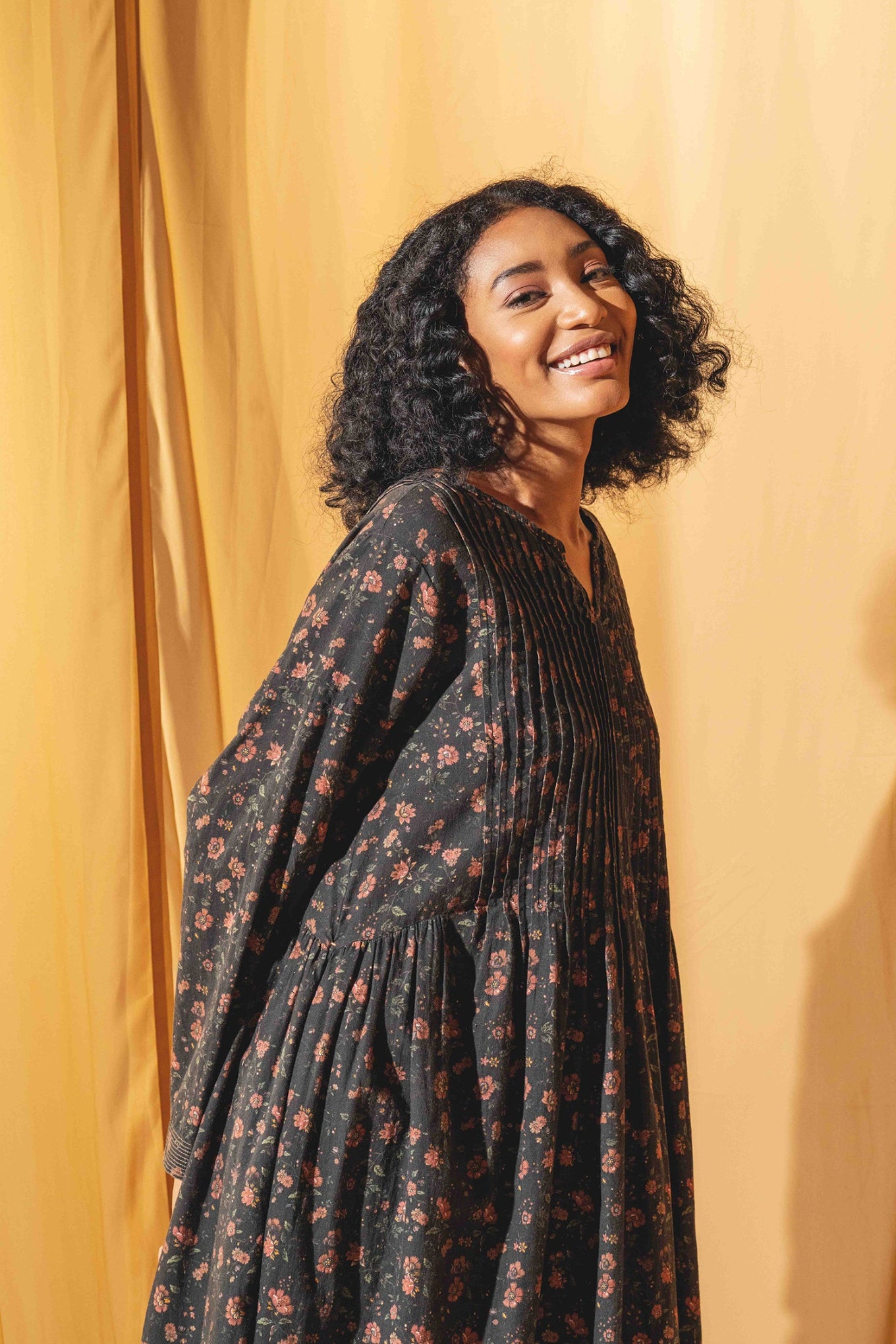 DVE Bhavya cotton linen long sleeve dress with pintucks in charcoal floral print.