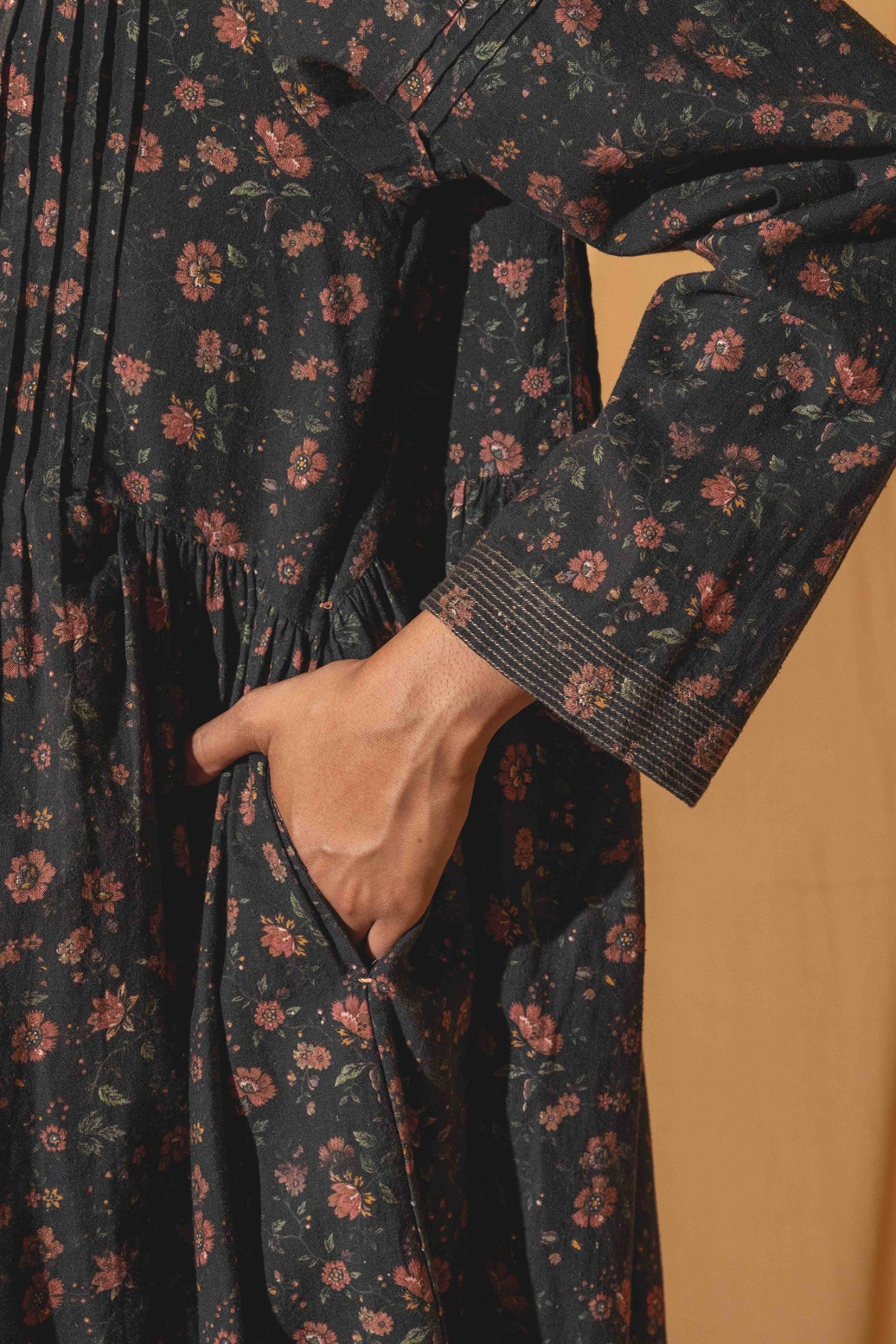 DVE Bhavya cotton linen long sleeve dress with pintucks in charcoal floral print.
