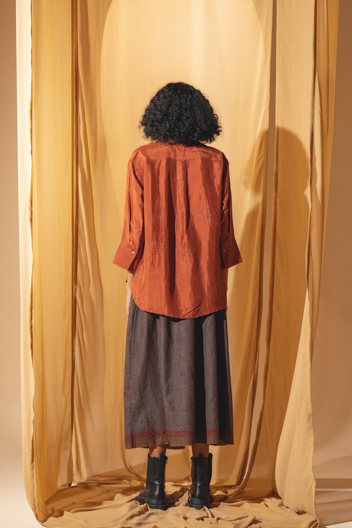 Dve Collection Arha silk button up blouse in rust.