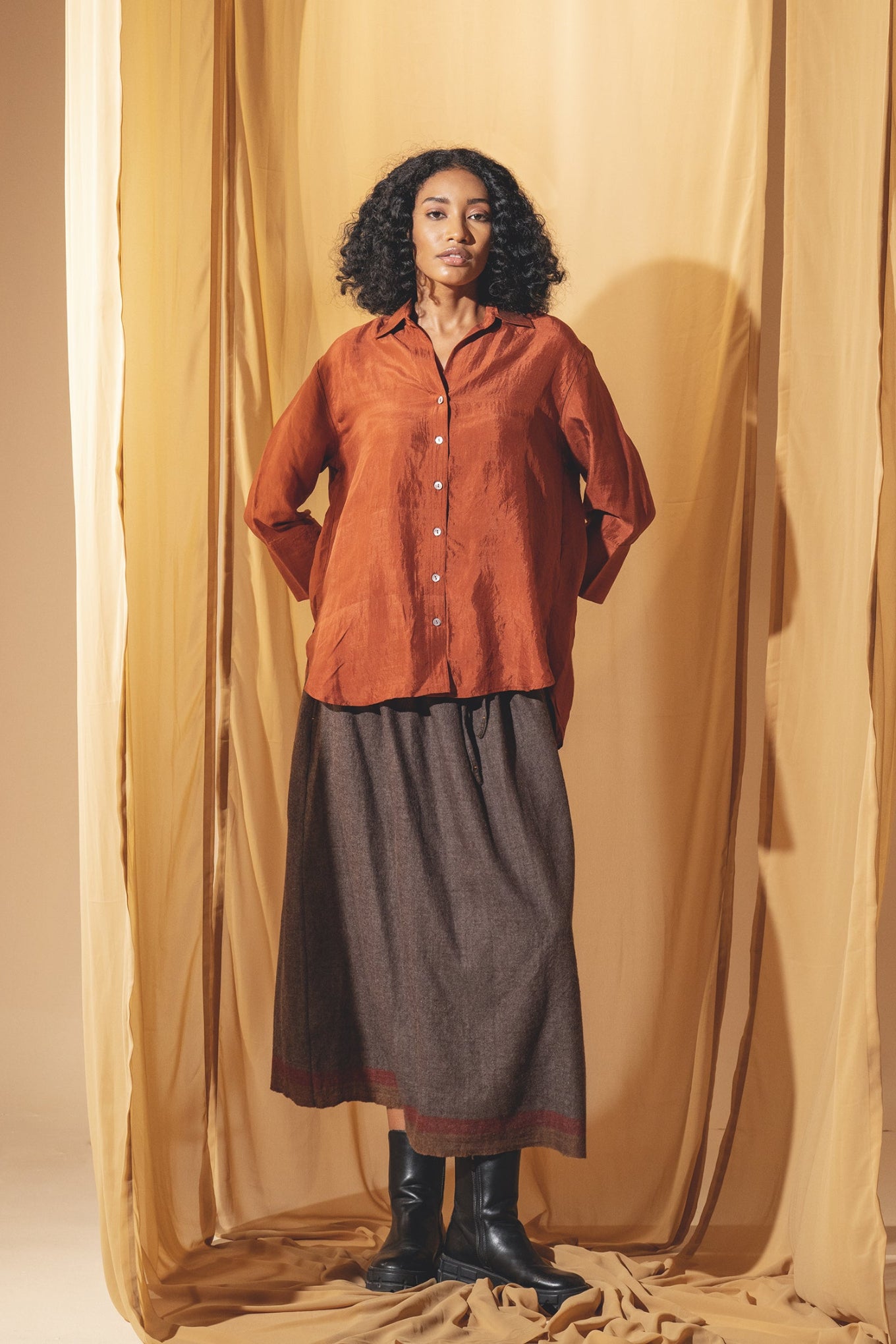 Dve Collection Arha silk button up blouse in rust.
