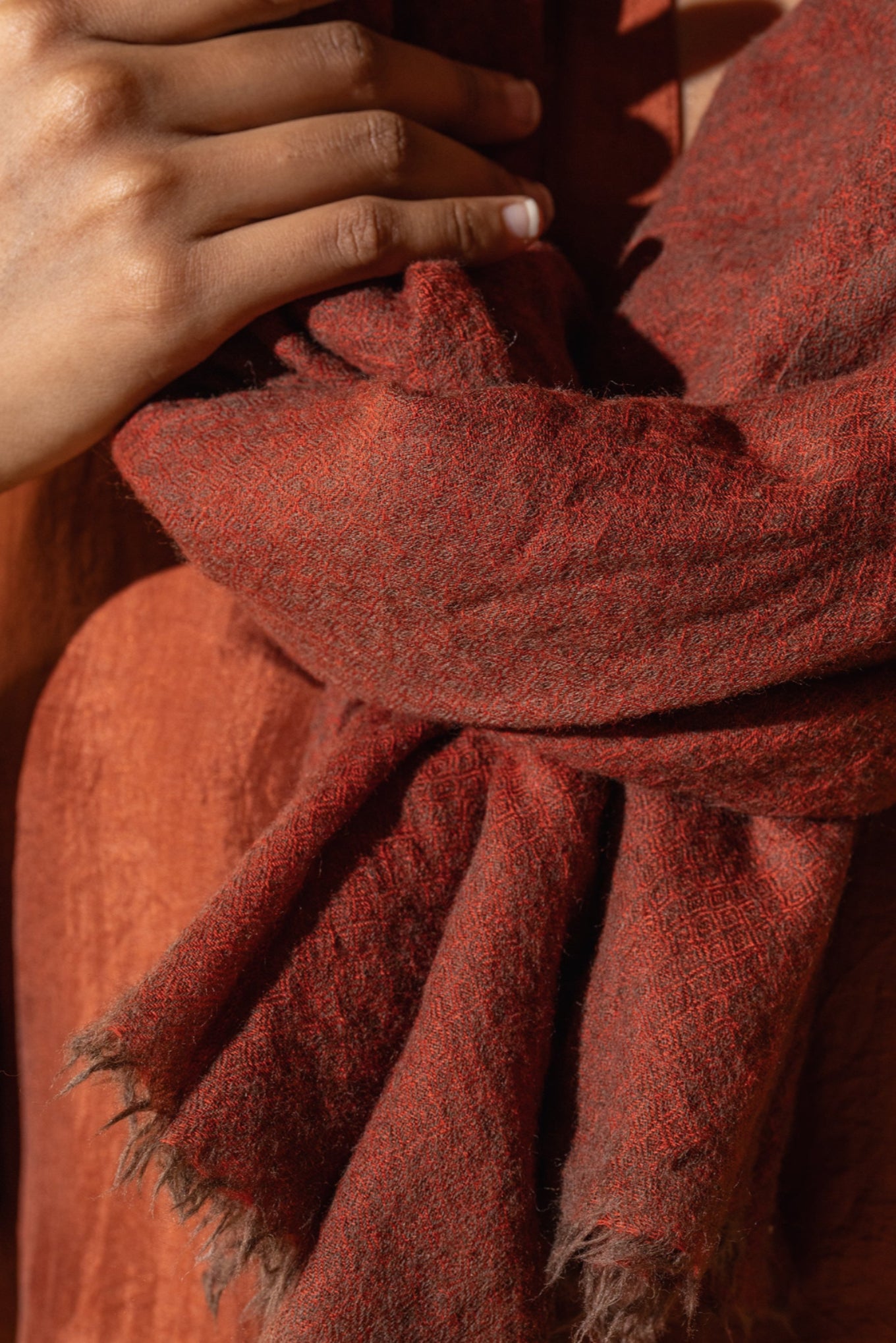 DVE rust brown wool scarf.