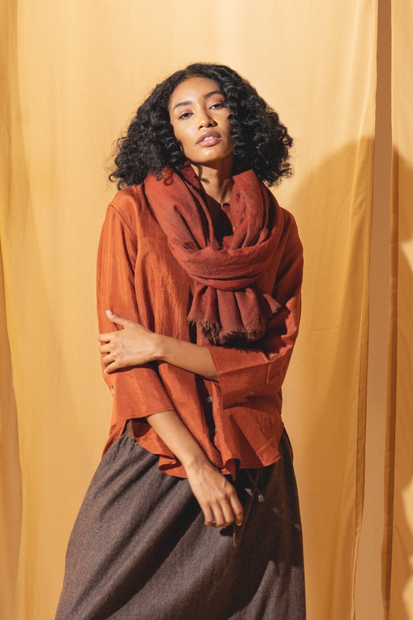 DVE rust brown wool scarf.