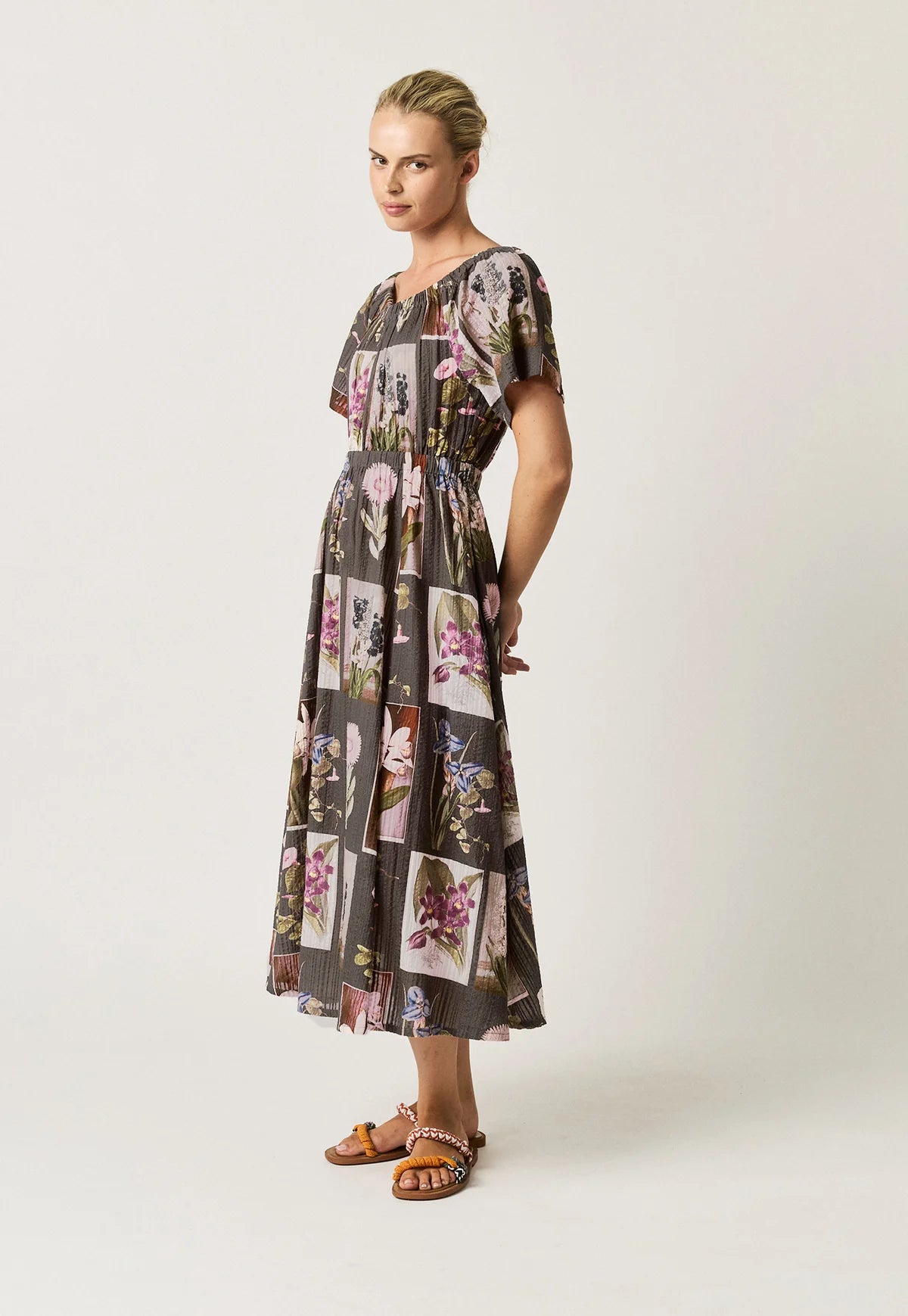 Nancybird Daphne cotton seersucker dress in charcoal floral archive print, gathere at neck, flared skirt.