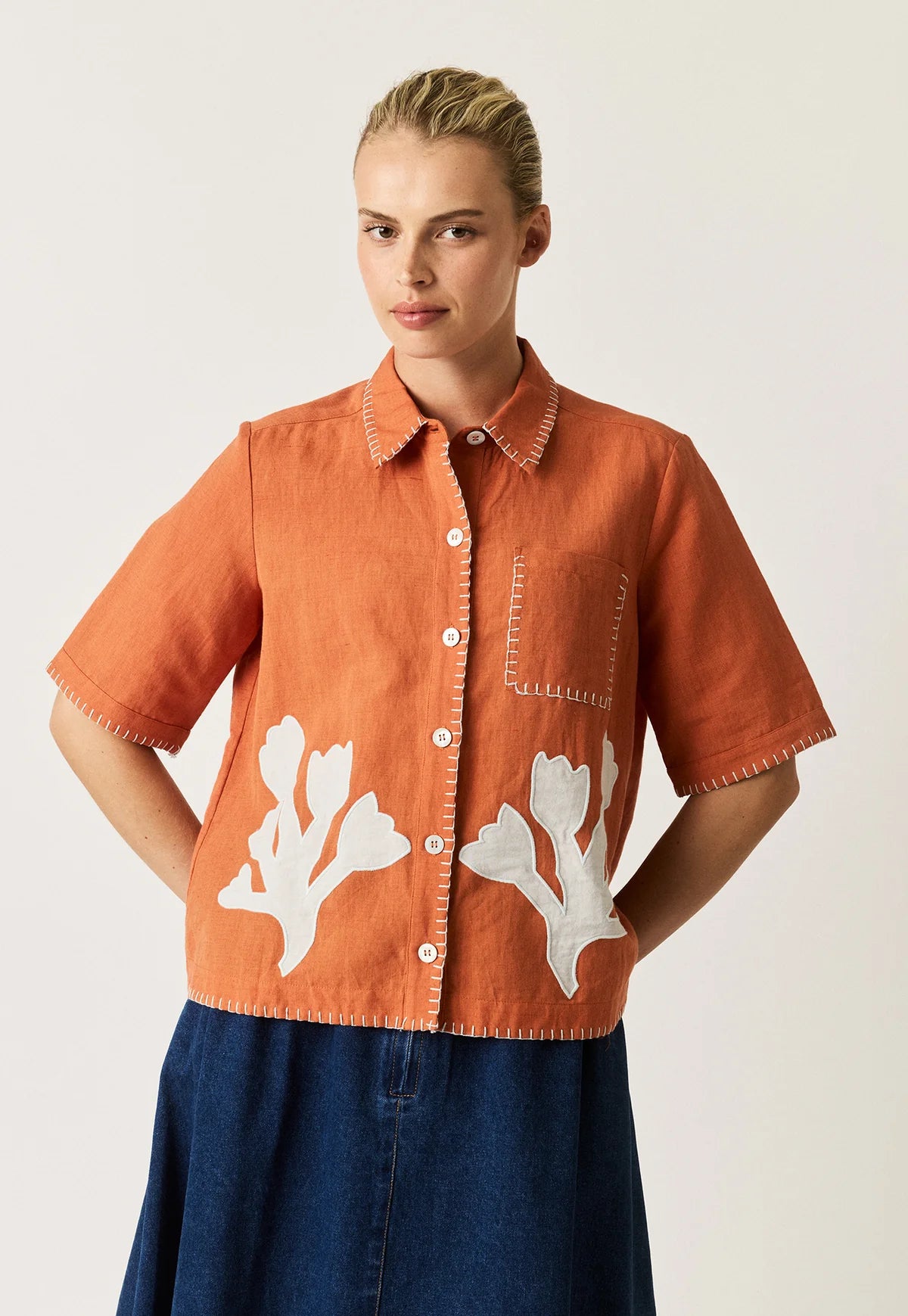 Nancybird Summer shirt applique linen cotton button up with coral shape on orange and contrast buttonhole edge stitching.