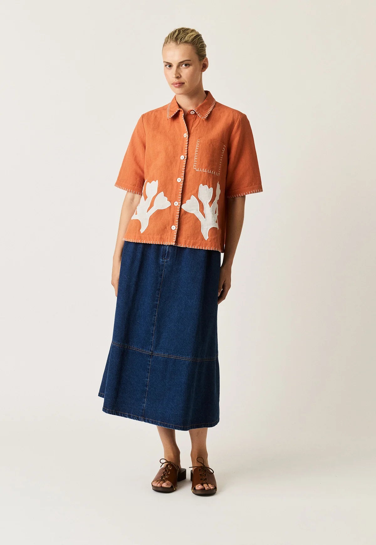 Nancybird Summer shirt applique linen cotton button up with coral shape on orange and contrast buttonhole edge stitching.