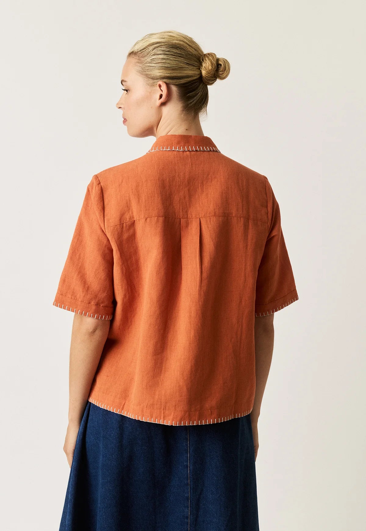 Nancybird Summer shirt applique linen cotton button up with coral shape on orange and contrast buttonhole edge stitching.