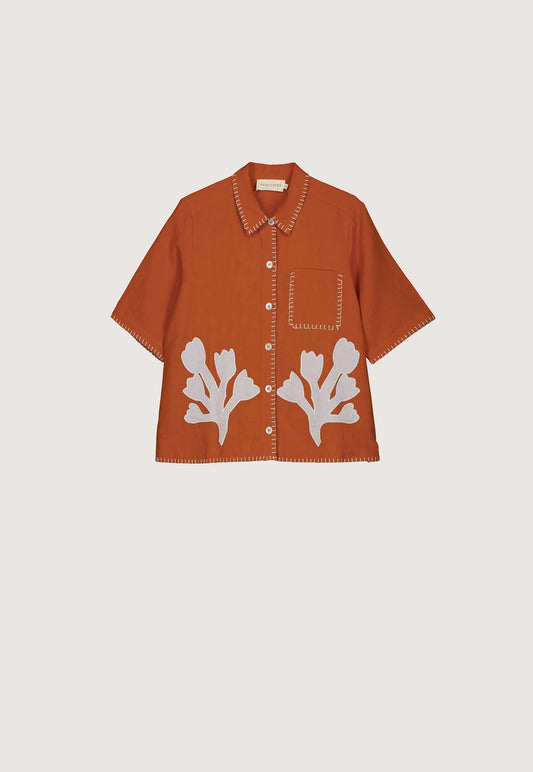 Nancybird Summer shirt applique linen cotton button up with coral shape on orange and contrast buttonhole edge stitching.
