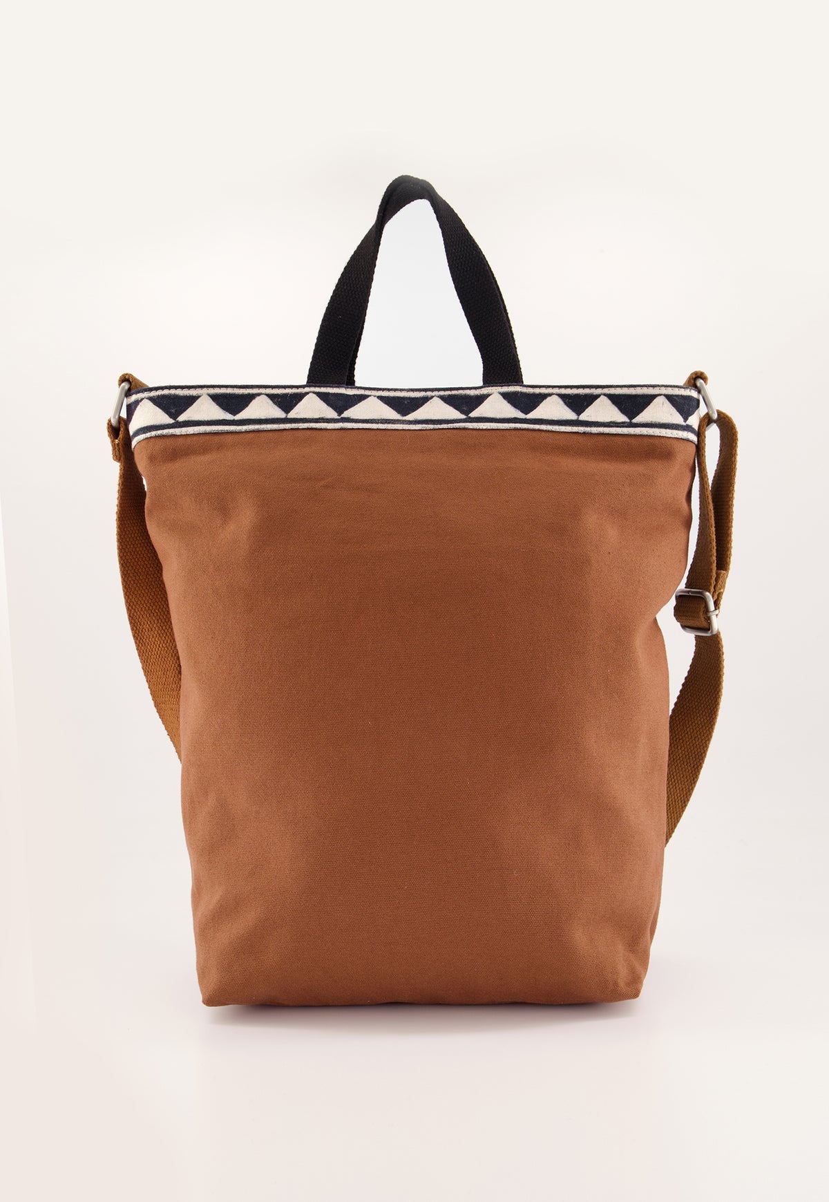 Nancybird brown shoulder bag featuring a front pocket printed with yellow lemons and a white floral pattern, set against a clean white background.