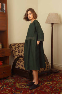 DVE Collection classic Padma dress in soft wool forest green.