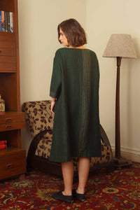 DVE Collection classic Padma dress in soft wool forest green.