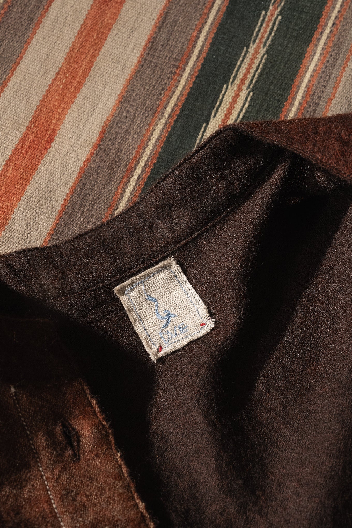 DVE Santati fine wool reversible jacket in pinecone brown.