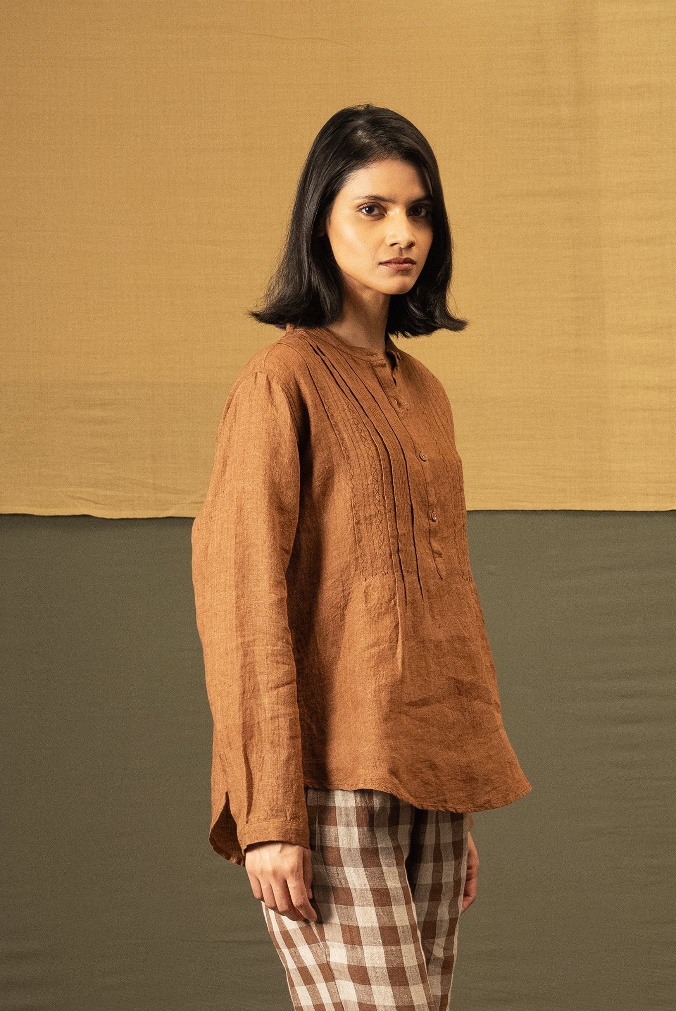 DVE Apa button up collarless linen blouse in French beige tan brown with pintuck and embroidered details.