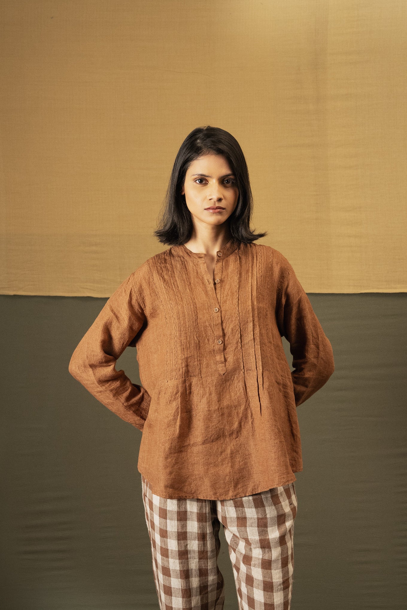 DVE Apa button up collarless linen blouse in French beige tan brown with pintuck and embroidered details.