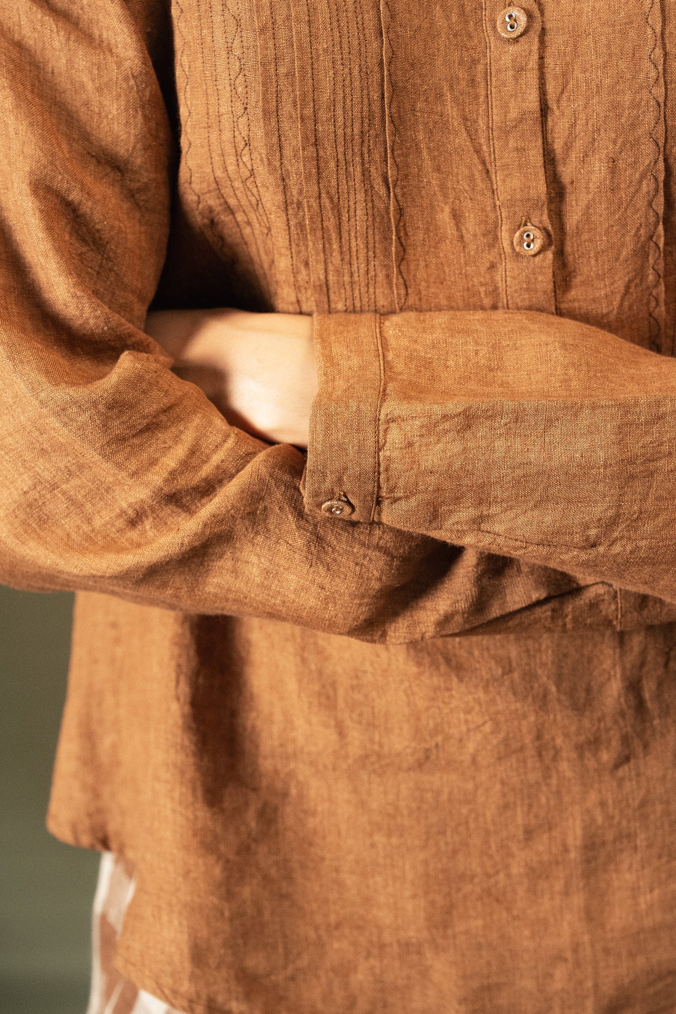 DVE Apa button up collarless linen blouse in French beige tan brown with pintuck and embroidered details.