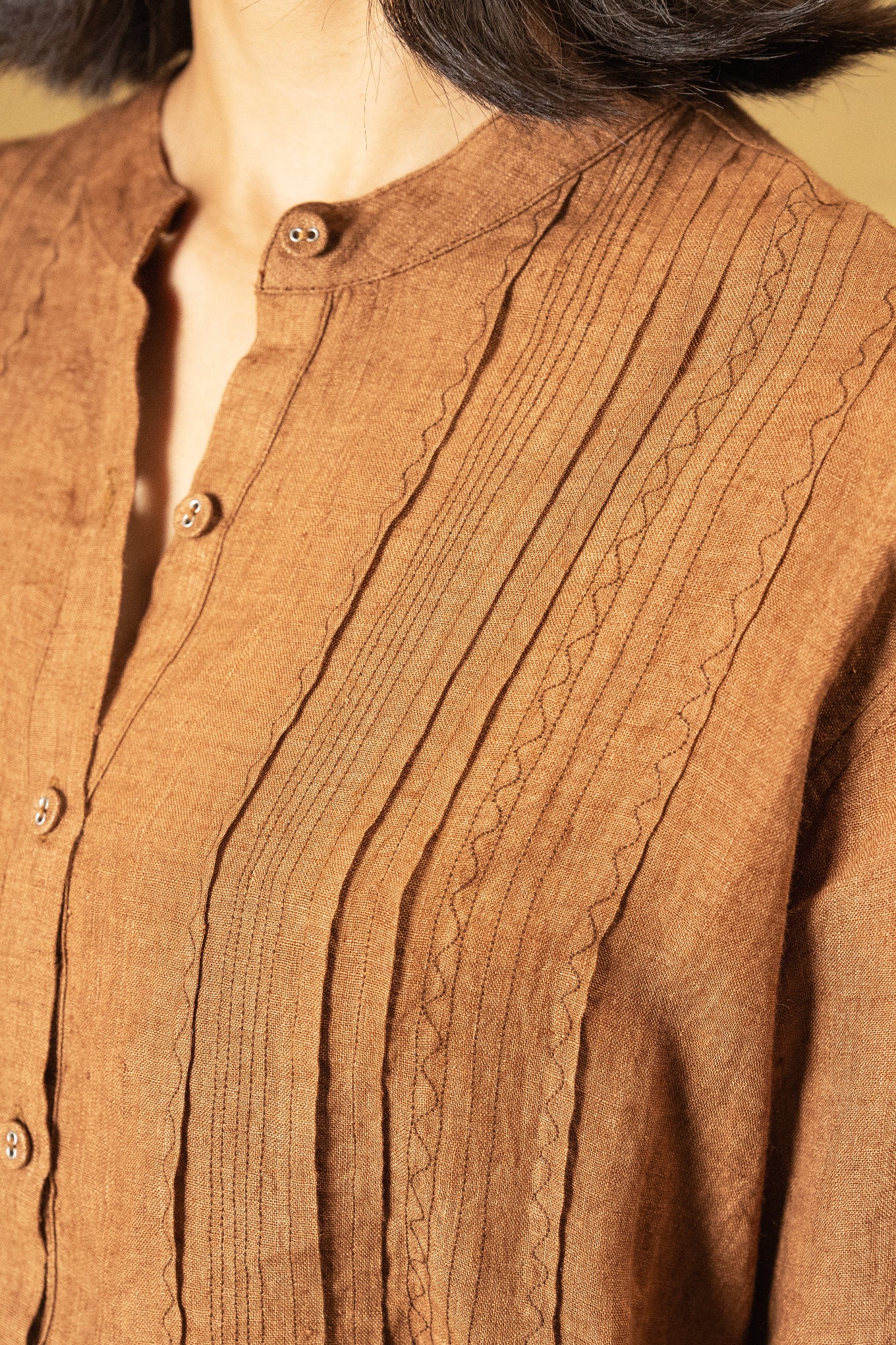 DVE Apa button up collarless linen blouse in French beige tan brown with pintuck and embroidered details.