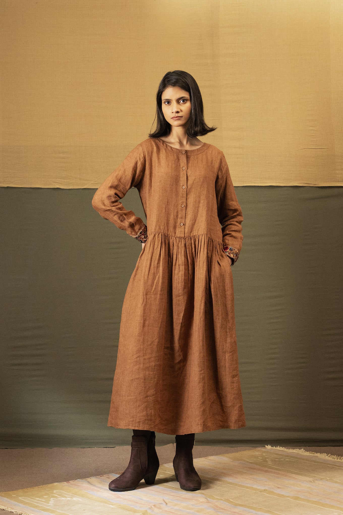 DVE Reeva dress in French beige linen with braid trim.